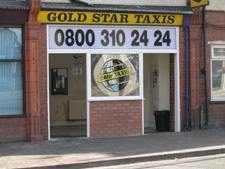 Goldstar Taxis sign